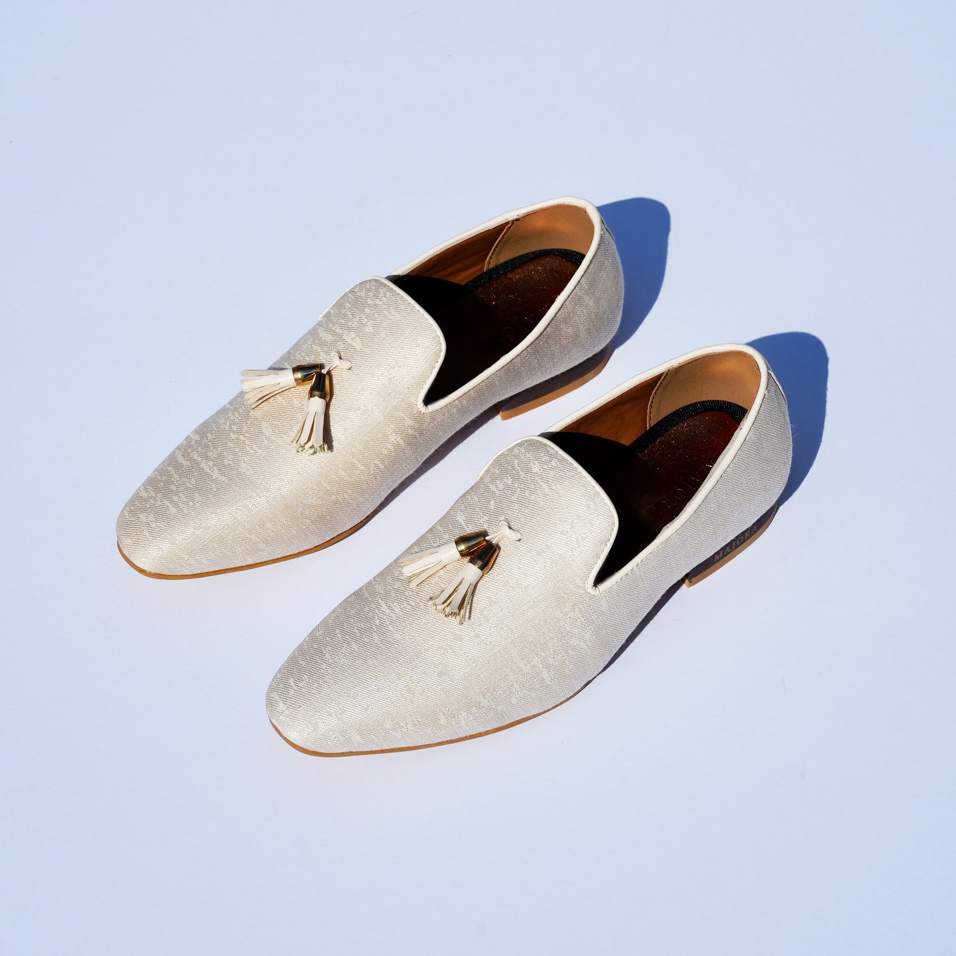 Photo of White Mojari in natural sunlight